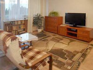 zdjęcie przedstawia salon w mieszkaniu na sprzedaż w Warszawie